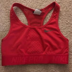 Pink small Nike pro combat sports bra